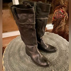 Frye tall black leather boots.